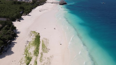 Obtenir son e-visa Zanzibar / Tanzanie en ligne — eVisa Access Visa Zanzibar en ligne pour passeport français — plage de sable blanc et mer turquoise de Nungwi, Zanzibar